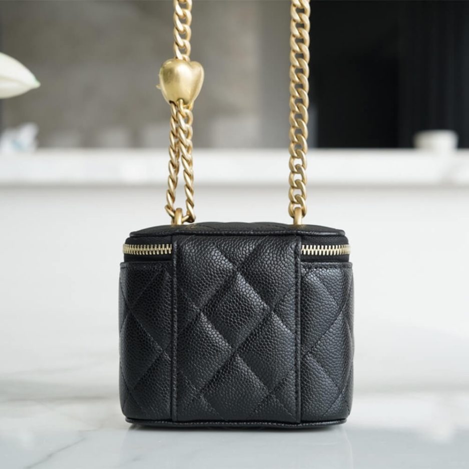 Ch*el small gold ball makeup bag