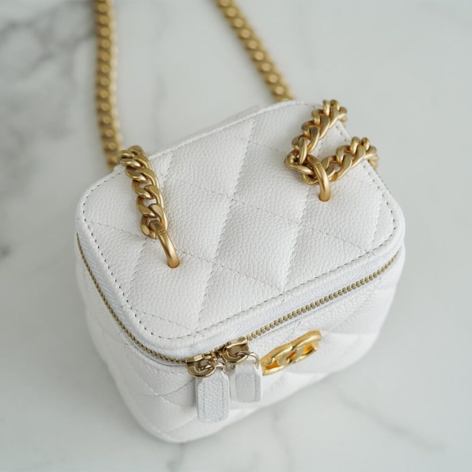 Ch*el small gold ball makeup bag