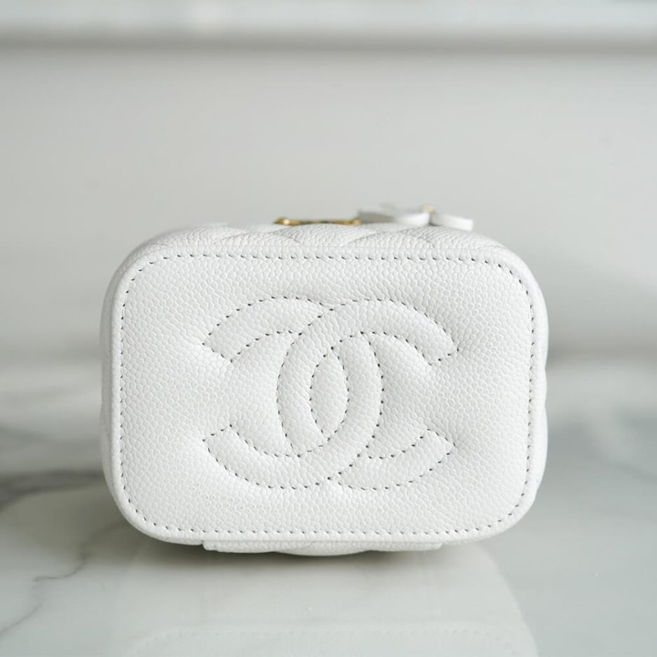 Ch*el small gold ball makeup bag